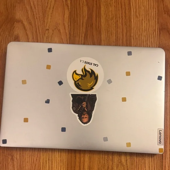 Lenovo Silver Laptop with Unique Stickers